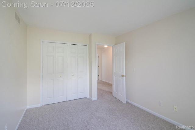 7924 Meadow Dr, Waterford, MI 48329 - unfurnished bedroom featuring carpet and a closet