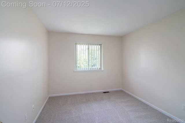 7924 Meadow Dr, Waterford, MI 48329 - spare room with carpet flooring and baseboards