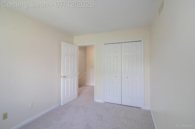 7924 Meadow Dr, Waterford, MI 48329 - unfurnished bedroom with carpet floors and a closet