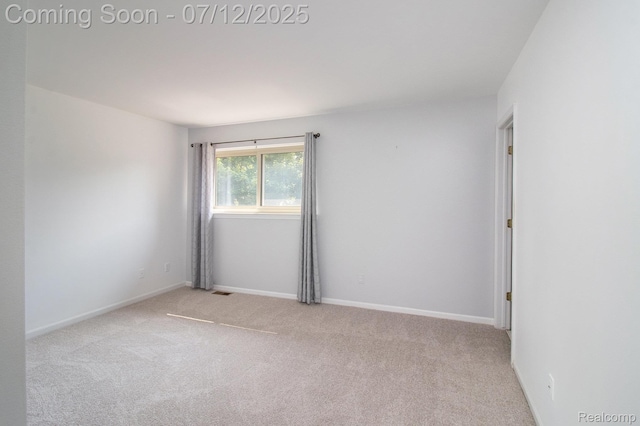 7924 Meadow Dr, Waterford, MI 48329 - carpeted spare room featuring baseboards