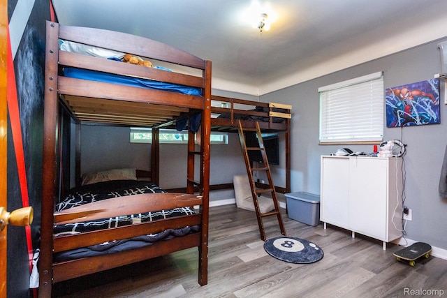8345 E 14 Mile Rd, Sterling Heights, MI 48312 - bedroom with wood finished floors and baseboards