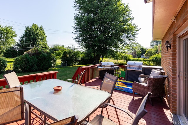 8345 E 14 Mile Rd, Sterling Heights, MI 48312 - wooden terrace featuring outdoor dining area and grilling area