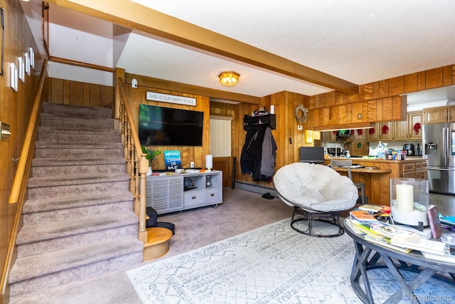8345 E 14 Mile Rd, Sterling Heights, MI 48312 - living area with wooden walls, stairway, a textured ceiling, light carpet, and beamed ceiling