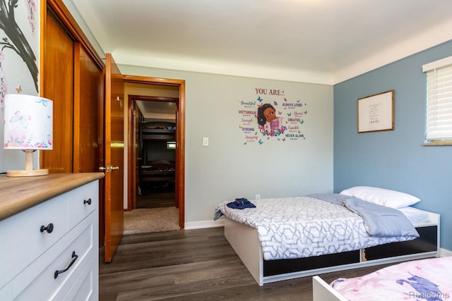 8345 E 14 Mile Rd, Sterling Heights, MI 48312 - bedroom featuring dark wood-type flooring and a closet