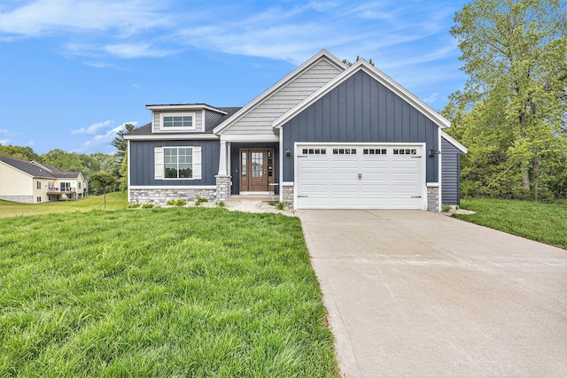 LOT99 Rose Ridge Dr, Rockford, MI 49341 - view of front of home featuring board and batten siding, a front lawn, and a garage