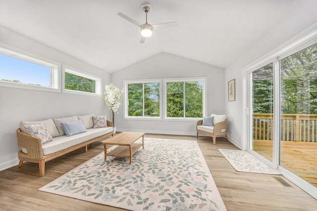LOT99 Rose Ridge Dr, Rockford, MI 49341 - living area with vaulted ceiling, ceiling fan, and wood finished floors