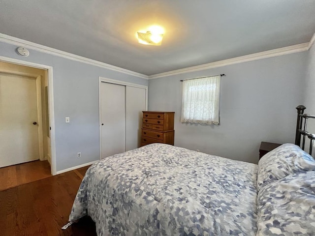3304 Wanda Ave, Muskegon, MI 49442 - bedroom with crown molding, wood finished floors, and a closet