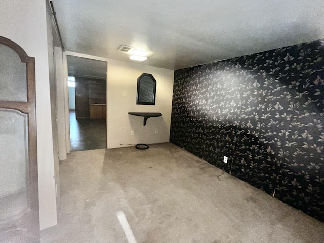 3304 Wanda Ave, Muskegon, MI 49442 - spare room with carpet