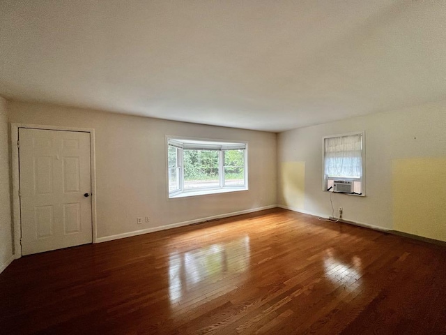 3304 Wanda Ave, Muskegon, MI 49442 - spare room featuring wood finished floors and cooling unit