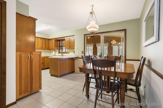 1838 Kings Ct, Muskegon, MI 49445 - dining area featuring light tile patterned floors