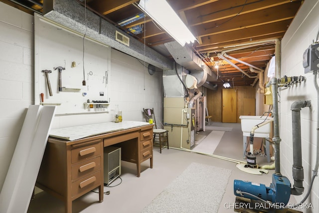 1838 Kings Ct, Muskegon, MI 49445 - unfinished basement featuring heating unit