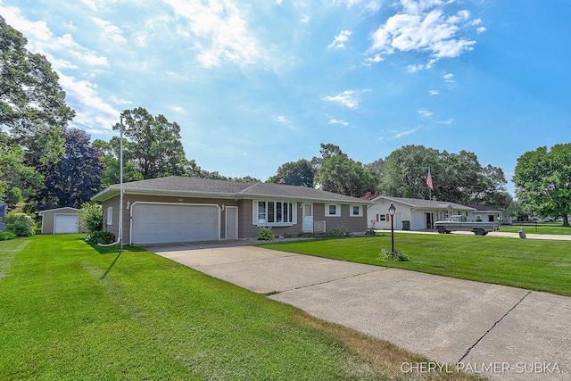 1838 Kings Ct, Muskegon, MI 49445 - ranch-style house featuring a front lawn, an attached garage, and concrete driveway