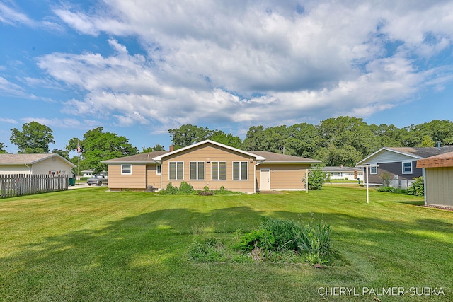 1838 Kings Ct, Muskegon, MI 49445 - back of house with a chimney