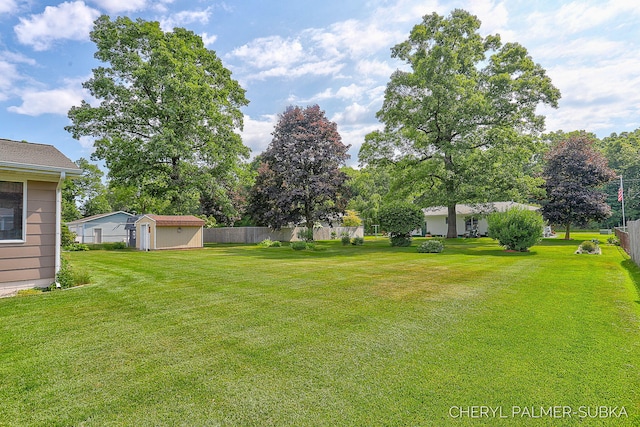 1838 Kings Ct, Muskegon, MI 49445 - view of yard with a storage shed