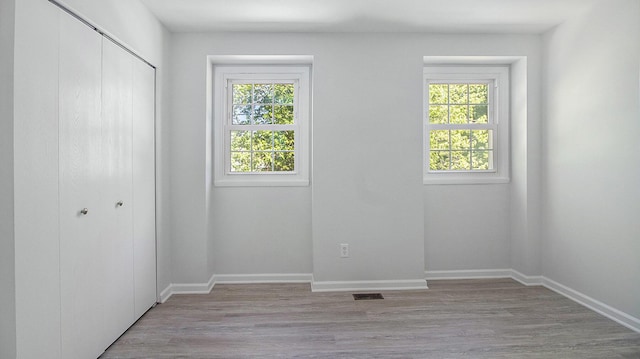 1796 Norfolk Ave, Ypsilanti, MI 48198 - unfurnished bedroom with a closet and light wood-style floors