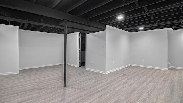 1796 Norfolk Ave, Ypsilanti, MI 48198 - finished below grade area with wood finished floors and baseboards