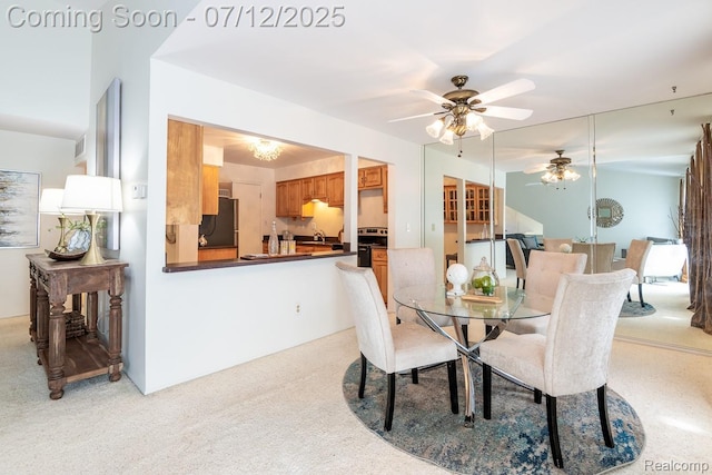 7427 Radcliff Ct, West Bloomfield, MI 48322 - dining room with a ceiling fan and light colored carpet