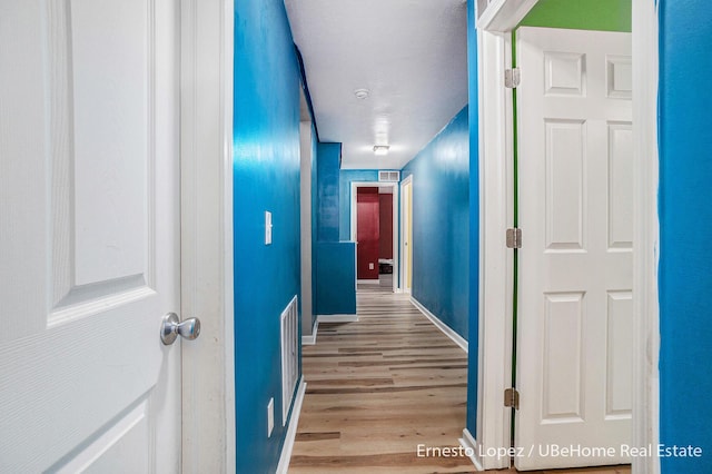 4061 Tributary Dr, Holland, MI 49424 - hall featuring wood finished floors and baseboards
