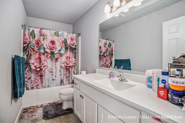 4061 Tributary Dr, Holland, MI 49424 - bathroom with vanity, shower / bath combination with curtain, and wood finished floors