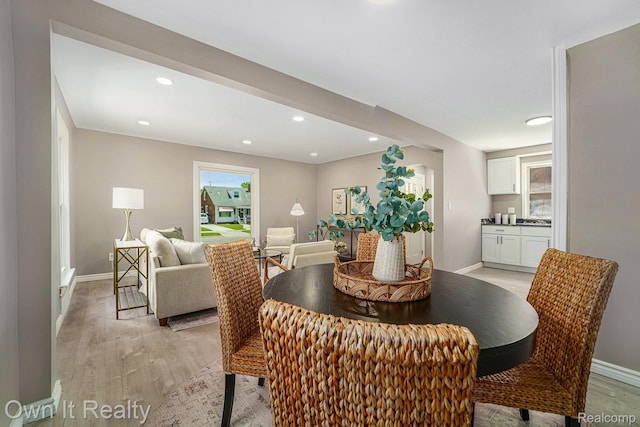 6031 Grandville Ave, Dearborn, MI 48228 - dining room featuring light wood-type flooring and recessed lighting