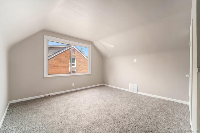 6031 Grandville Ave, Dearborn, MI 48228 - additional living space with vaulted ceiling and carpet flooring