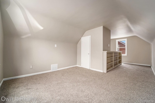 6031 Grandville Ave, Dearborn, MI 48228 - additional living space with carpet and vaulted ceiling