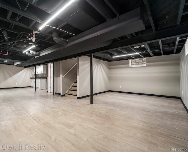 6031 Grandville Ave, Dearborn, MI 48228 - below grade area with wood finished floors and stairway