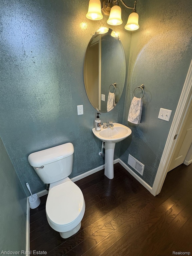 8213 Bayberry Ct, Dexter, MI 48130 - bathroom featuring hardwood / wood-style floors and baseboards