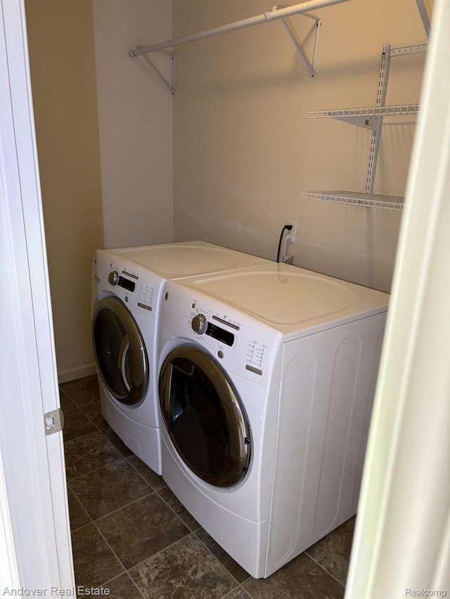 8213 Bayberry Ct, Dexter, MI 48130 - laundry room featuring washer and dryer and baseboards
