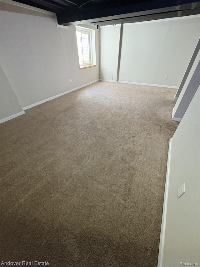 8213 Bayberry Ct, Dexter, MI 48130 - below grade area featuring carpet flooring and baseboards