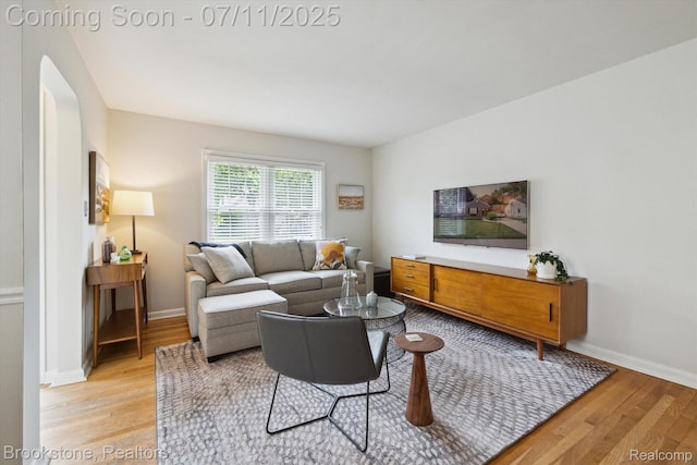 2351 Earlmont Rd, Berkley, MI 48072 - living room featuring light wood finished floors and baseboards
