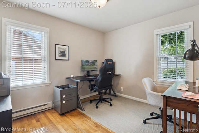2351 Earlmont Rd, Berkley, MI 48072 - office area with baseboard heating, healthy amount of natural light, and light wood-type flooring