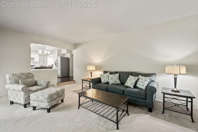 2686 Orbit Dr, Lake Orion, MI 48360 - living room featuring light colored carpet and a chandelier