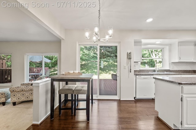 2686 Orbit Dr, Lake Orion, MI 48360 - kitchen featuring dishwasher, white cabinetry, dark wood-style flooring, a chandelier, and recessed lighting