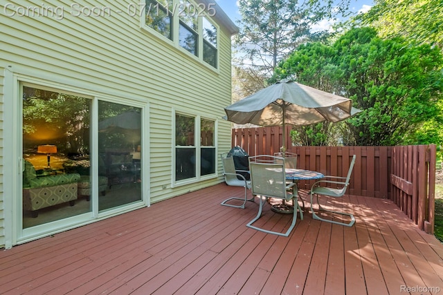 2686 Orbit Dr, Lake Orion, MI 48360 - wooden deck with outdoor dining space