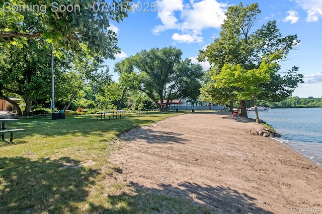 2686 Orbit Dr, Lake Orion, MI 48360 - view of property's community with a lawn and a water view