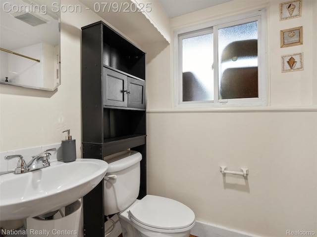 2553 Koper Dr, Macomb, MI 48310 - bathroom with toilet and a sink