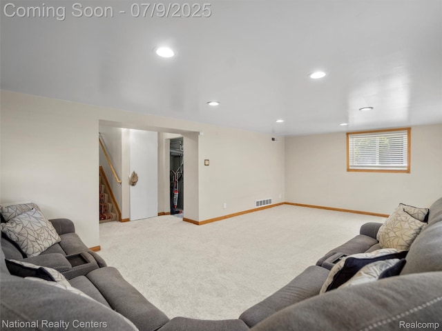 2553 Koper Dr, Macomb, MI 48310 - carpeted living area featuring stairs and recessed lighting