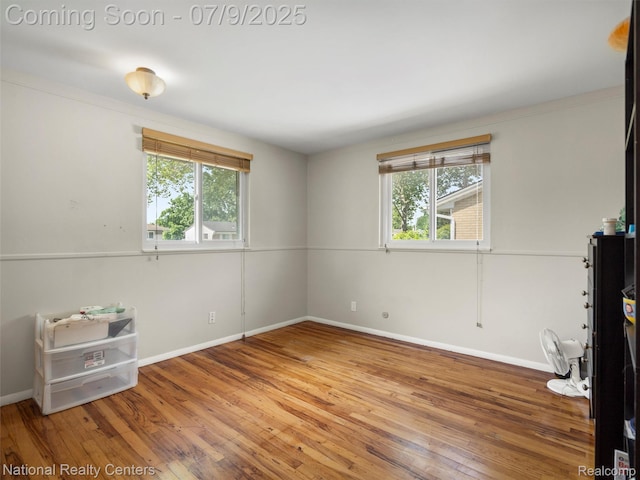 2553 Koper Dr, Macomb, MI 48310 - unfurnished room with hardwood / wood-style flooring