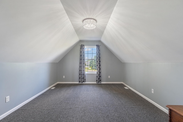 10501 Somerset Rd, Cement City, MI 49233 - bonus room featuring a chandelier, lofted ceiling, and carpet floors