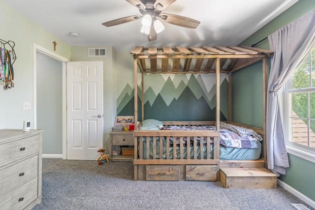 10501 Somerset Rd, Cement City, MI 49233 - carpeted bedroom with baseboards and a ceiling fan