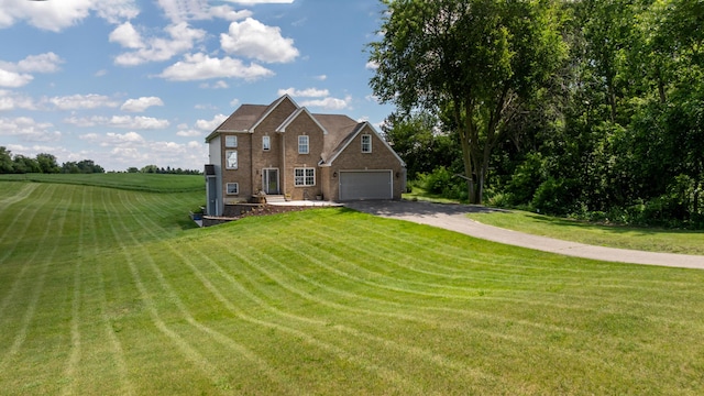 10501 Somerset Rd, Cement City, MI 49233 - view of front of property with driveway, brick siding, and a front yard