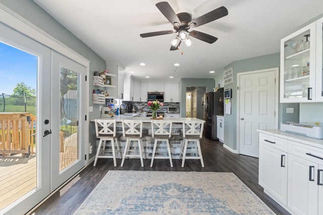 10501 Somerset Rd, Cement City, MI 49233 - dining space with dark wood-type flooring, a ceiling fan, and recessed lighting