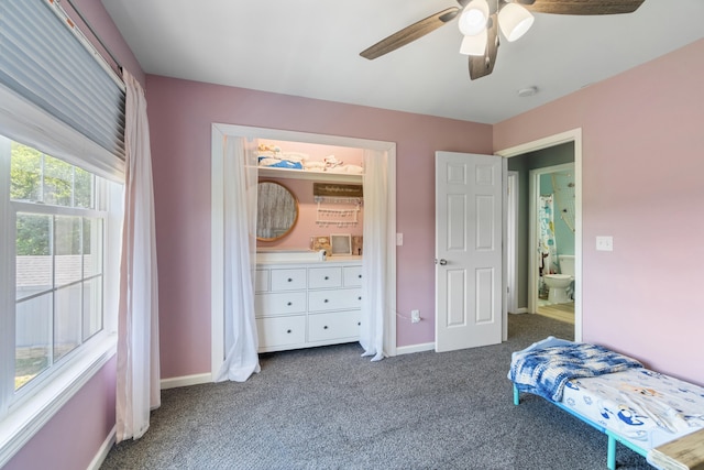 10501 Somerset Rd, Cement City, MI 49233 - carpeted bedroom with baseboards and ceiling fan