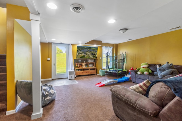 10501 Somerset Rd, Cement City, MI 49233 - living area featuring carpet floors, healthy amount of natural light, recessed lighting, and stairs