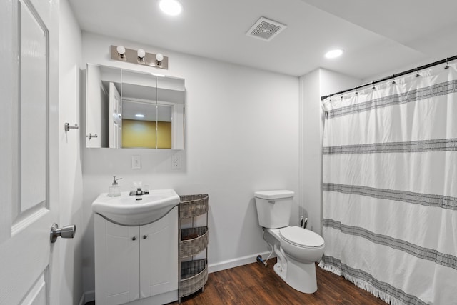 10501 Somerset Rd, Cement City, MI 49233 - full bathroom featuring vanity, wood finished floors, recessed lighting, and a shower with shower curtain