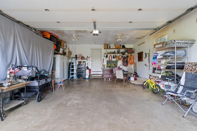 10501 Somerset Rd, Cement City, MI 49233 - garage featuring a garage door opener and ceiling fan