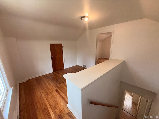 5565 Oldtown St, Detroit, MI 48224 - bonus room with vaulted ceiling and light wood-style floors