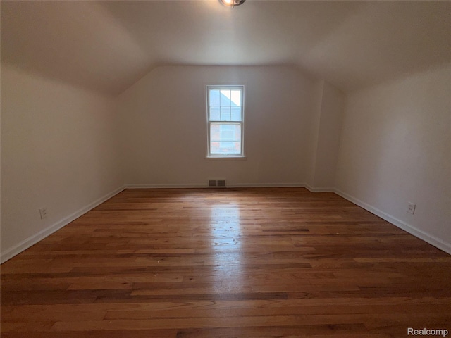 5565 Oldtown St, Detroit, MI 48224 - bonus room featuring vaulted ceiling and wood finished floors