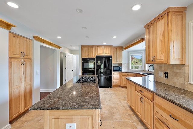 4700 Raap Rd, Bruce, MI 48065 - kitchen with black appliances, tasteful backsplash, dark stone countertops, and recessed lighting